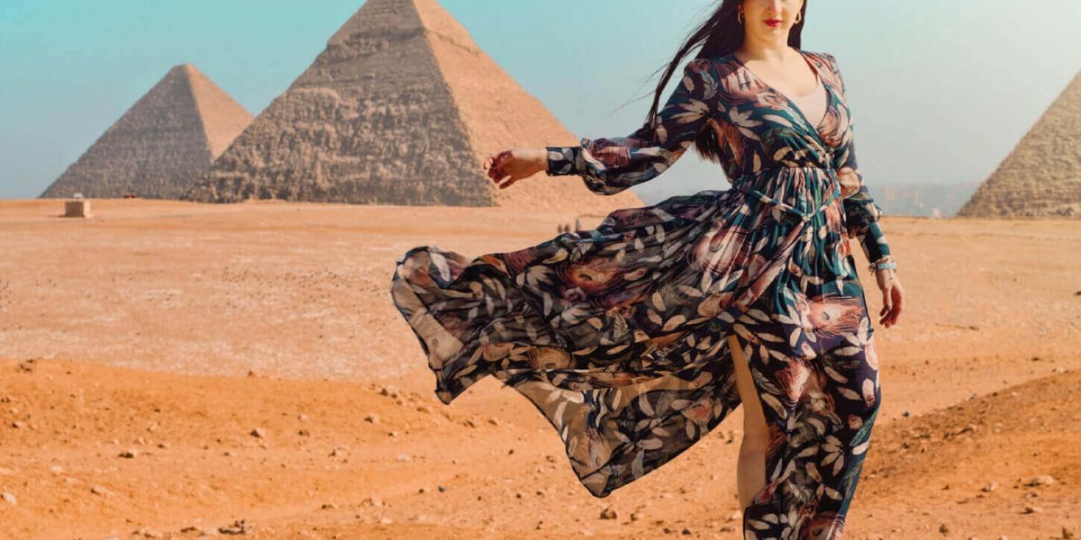 a-wonderful-shot-of-a-tourist-in-front-of-the-pyramids